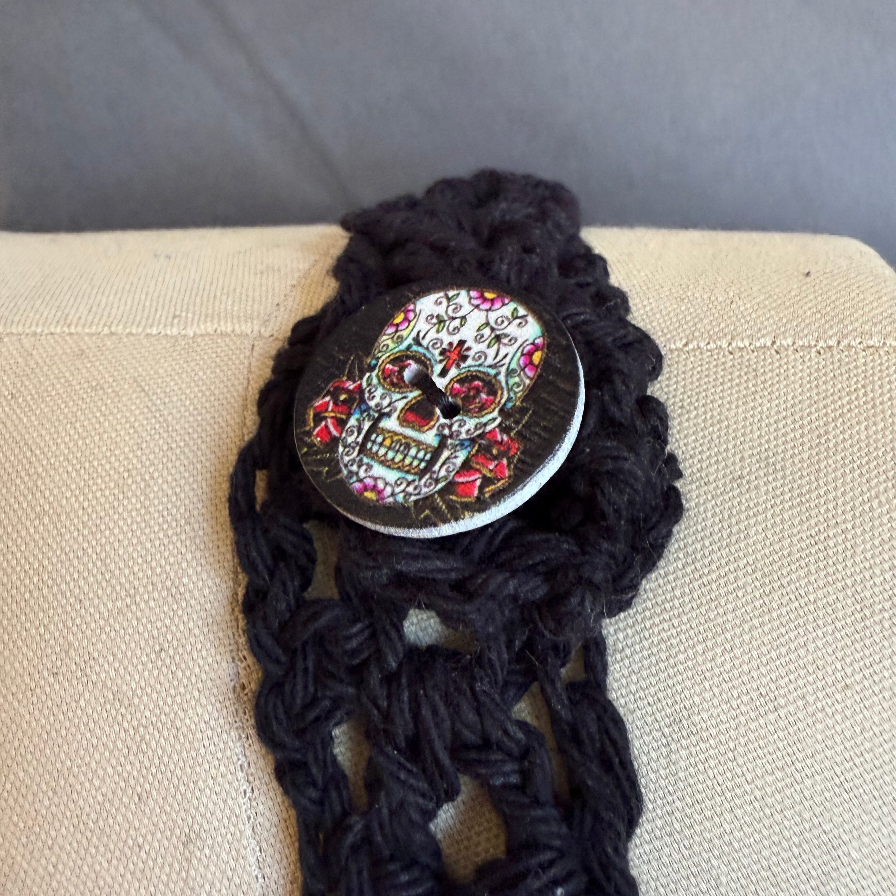 Sugar Skull decorative button on a neutral background